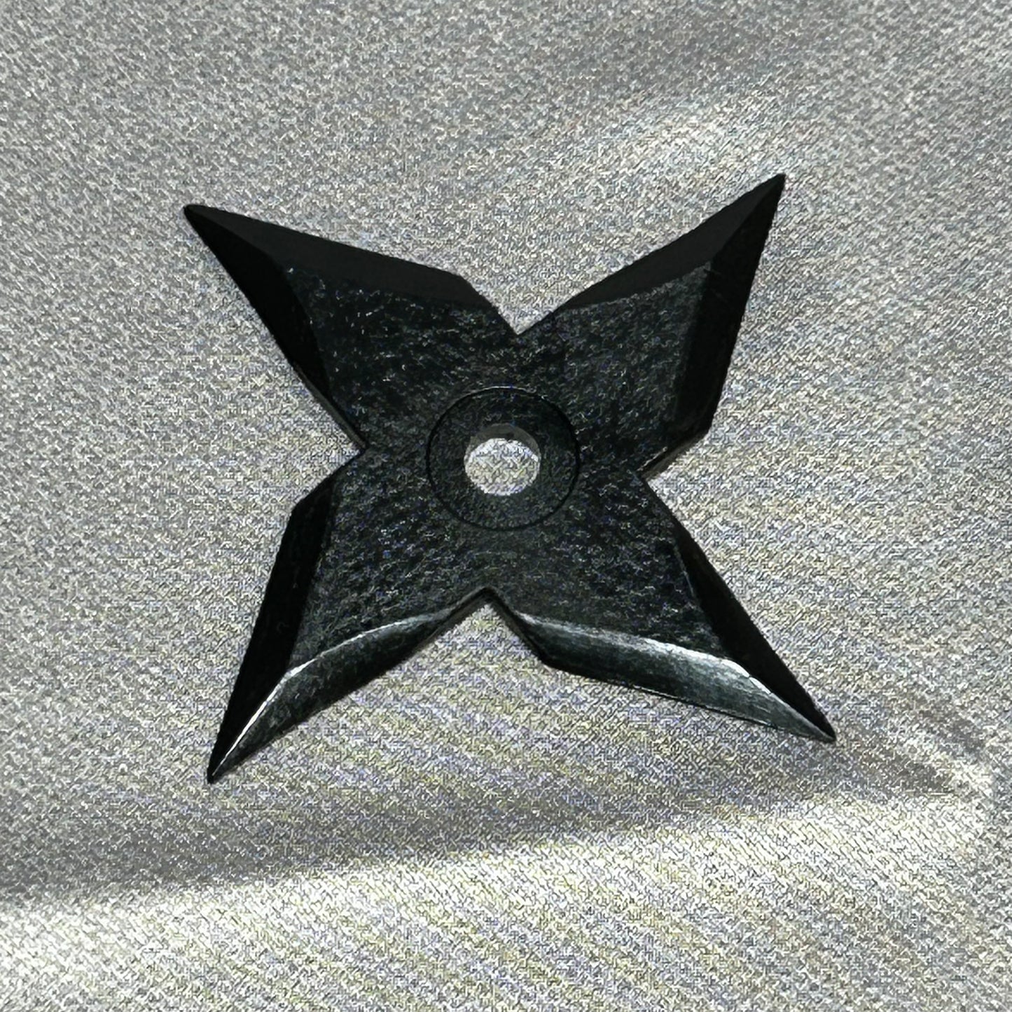 Rubber shuriken windmill type