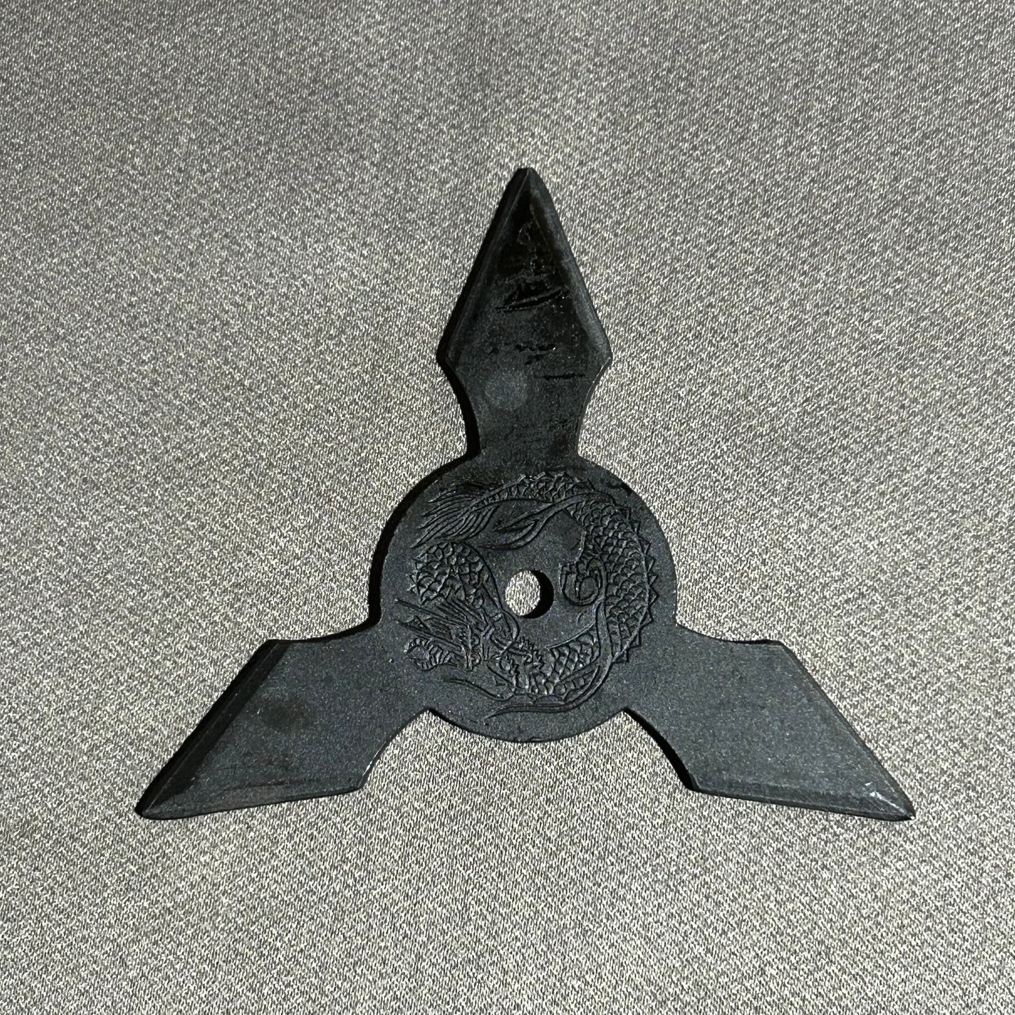 Black smoked shuriken triangular shape